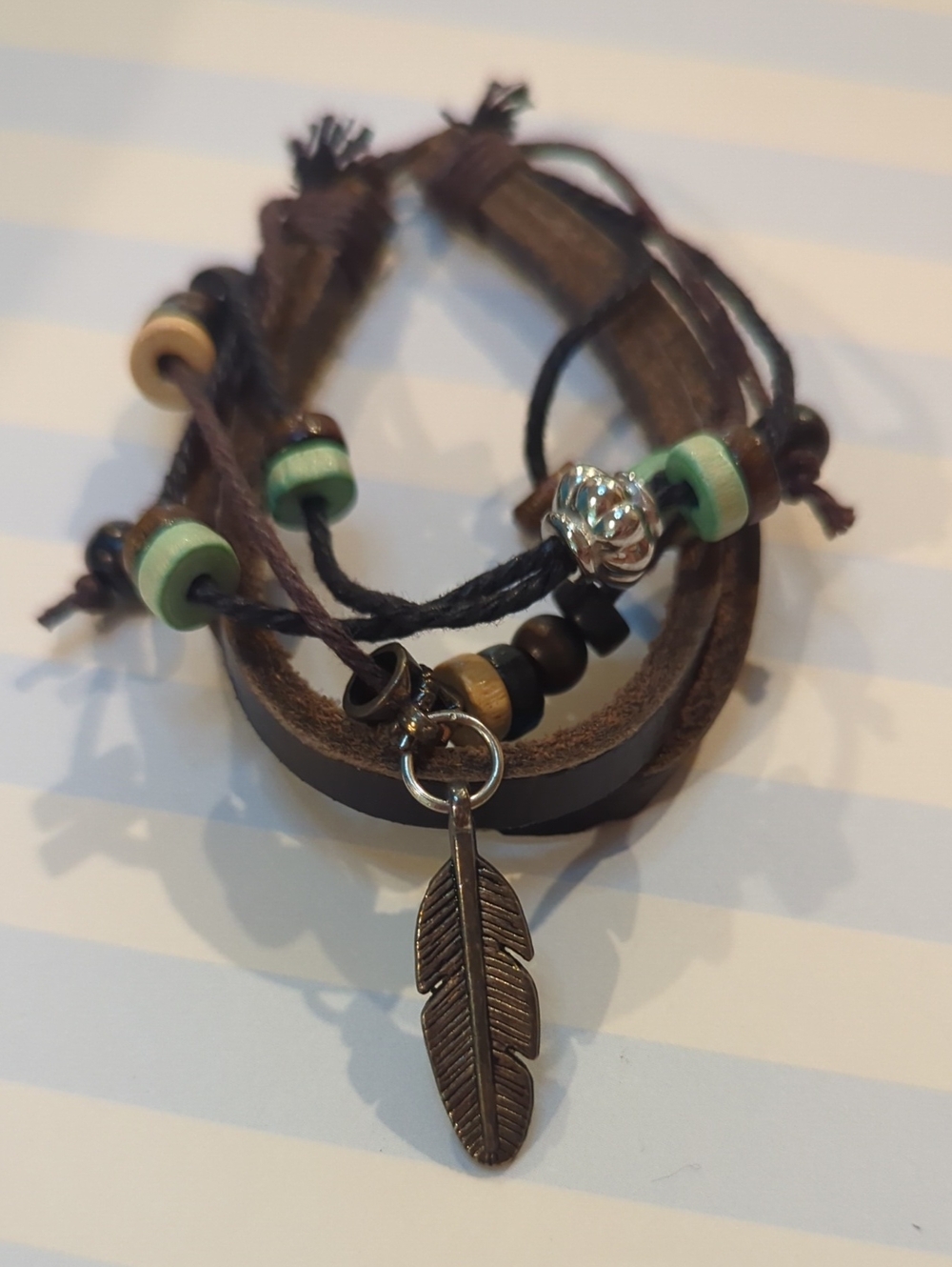 Feather charm and beaded Bracelet Men Or Women Adjustable Boho